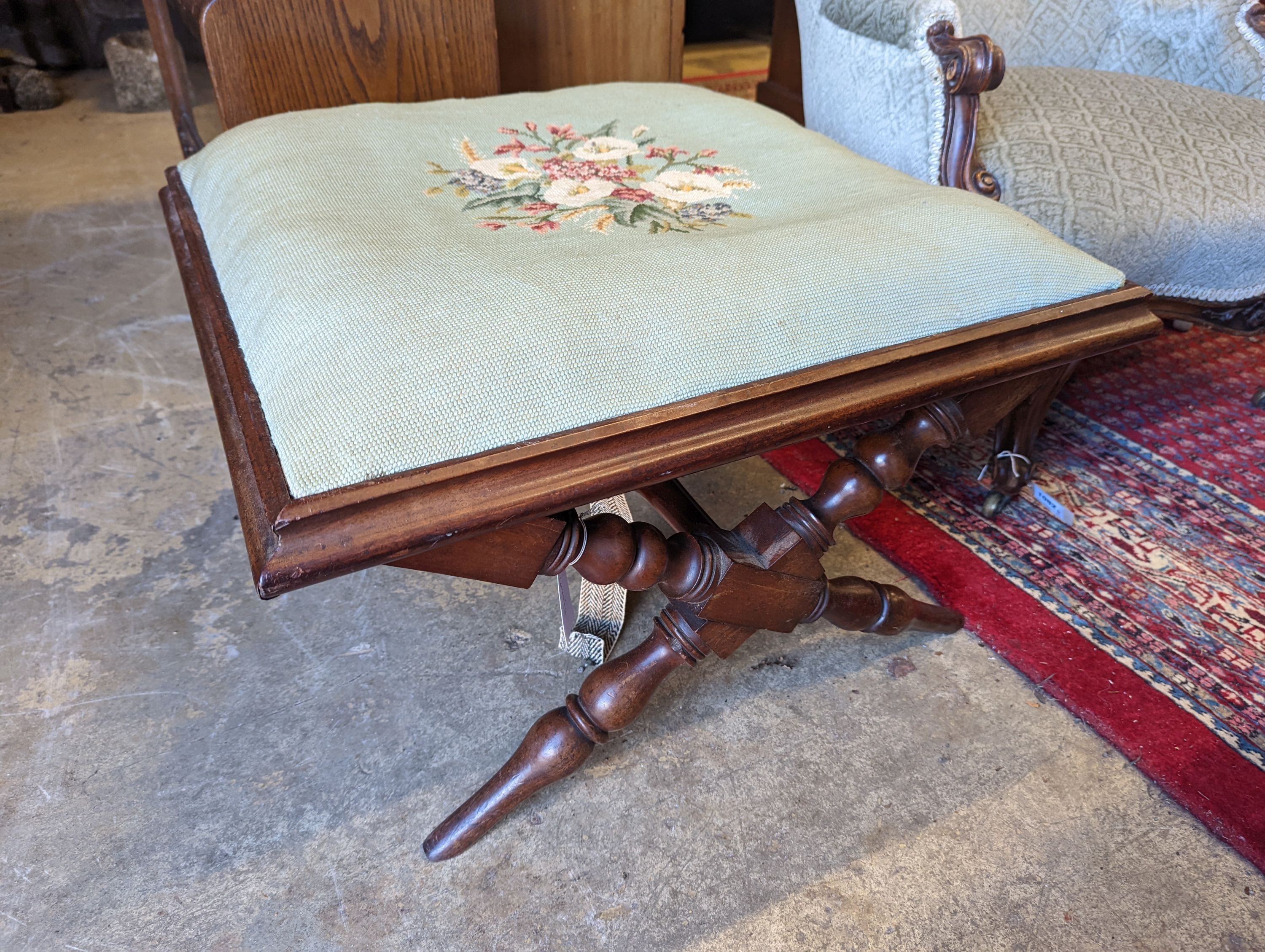 A Victorian mahogany X frame stool with tapestry top, length 65cm, depth 65cm, height 36cm